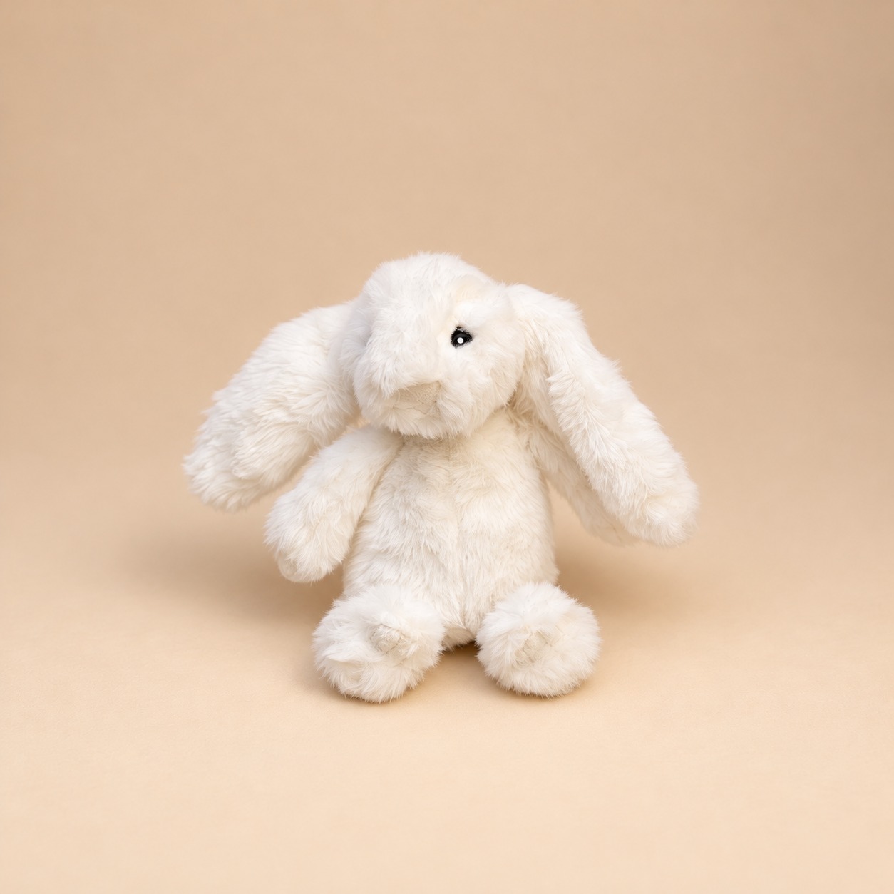 Conejo pequeño blanco